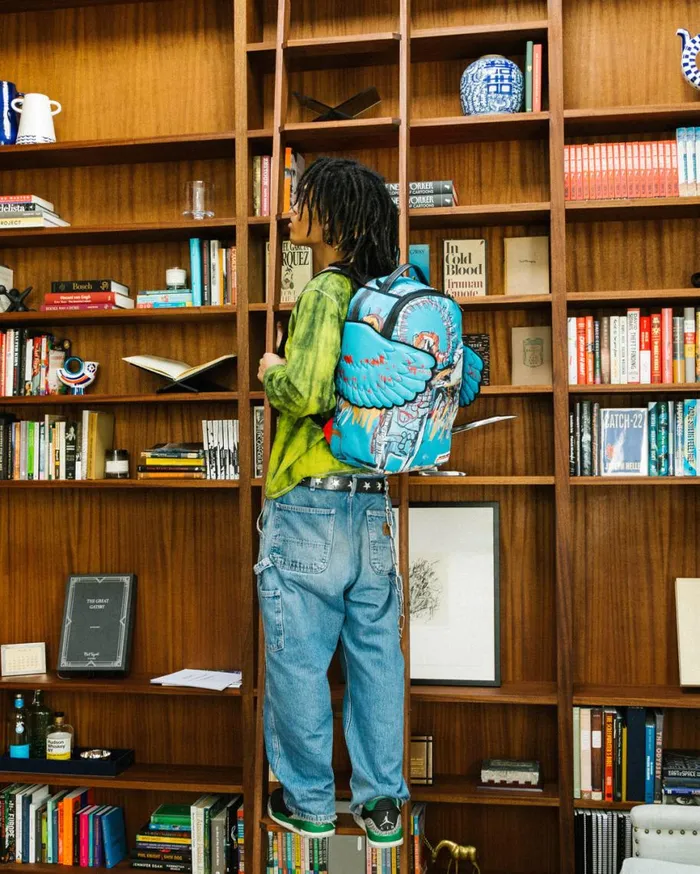 SPRAYGROUND Backpacks OFFICIAL BASQUIAT UNTITLED FALLEN ANGEL 1981 WING BACKPACK DLXV 8211 Universal SPRAYGROUND Backpacks OFFICIAL BASQUIAT UNTITLED FALLEN ANGEL 1981 WING BACKPACK DLXV 8211 Universal